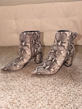 Marc Fisher Snake-Print Pointed Toe Ankle Boots in White and Black